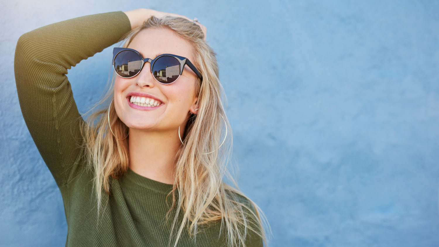 Smiling Woman With Sunglasses